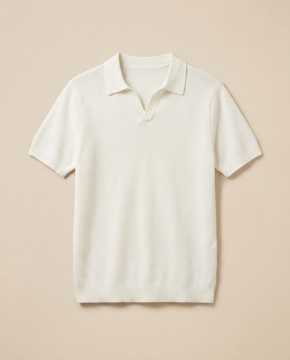 Amalfi Knit Polo in Pearl White, front packshot on a warm beige background