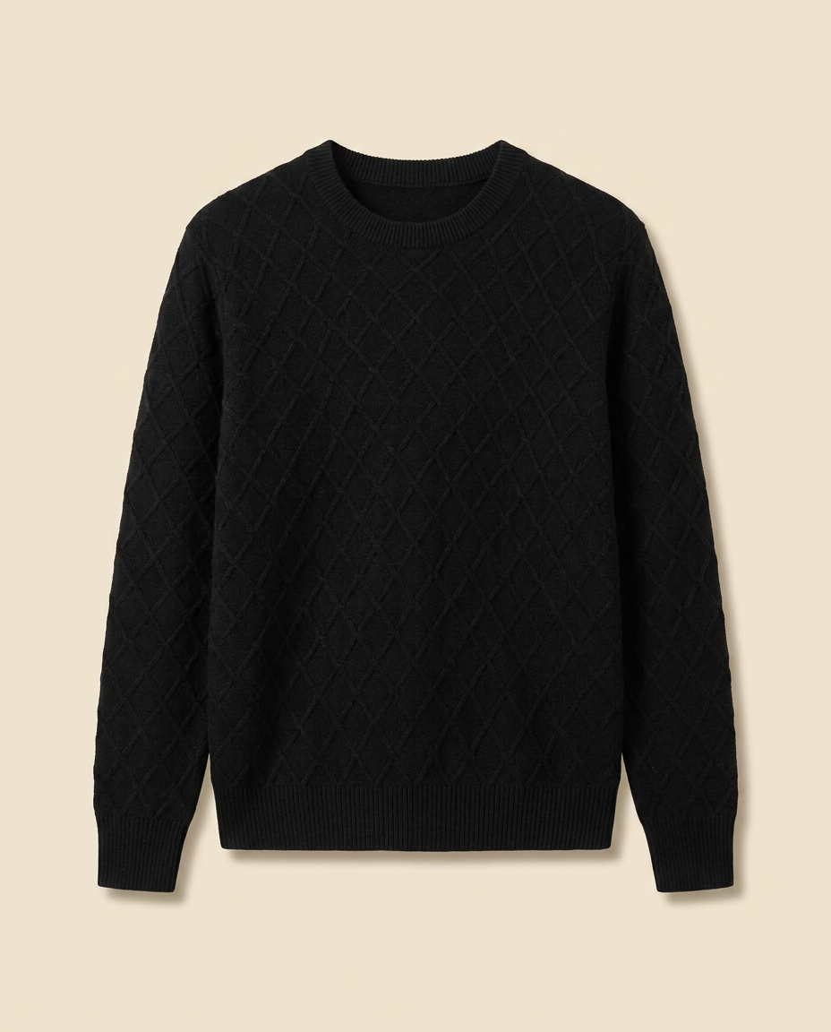 Megève Knit Sweater in Noir, front packshot on a cream background