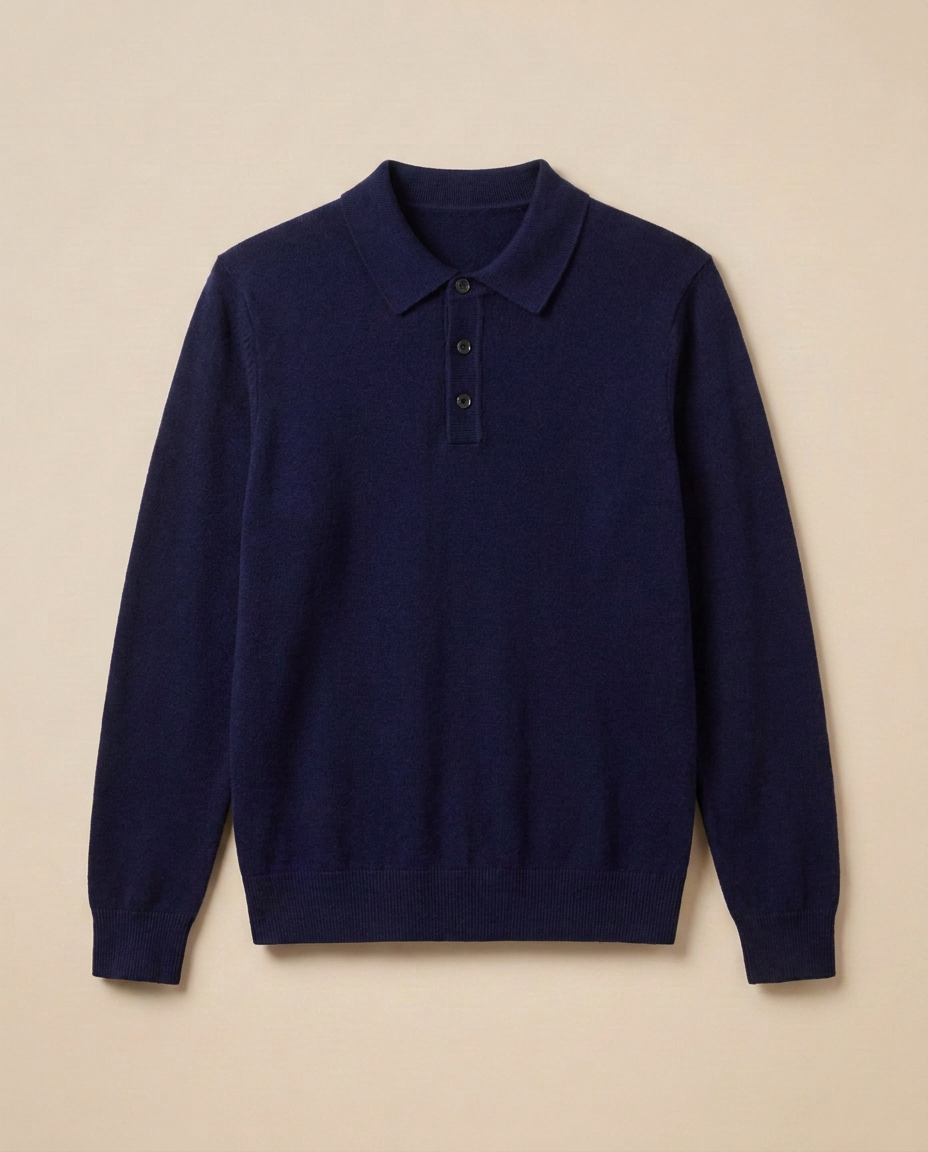 Biarritz Knit Polo in Midnight Navy, front packshot on a warm beige background