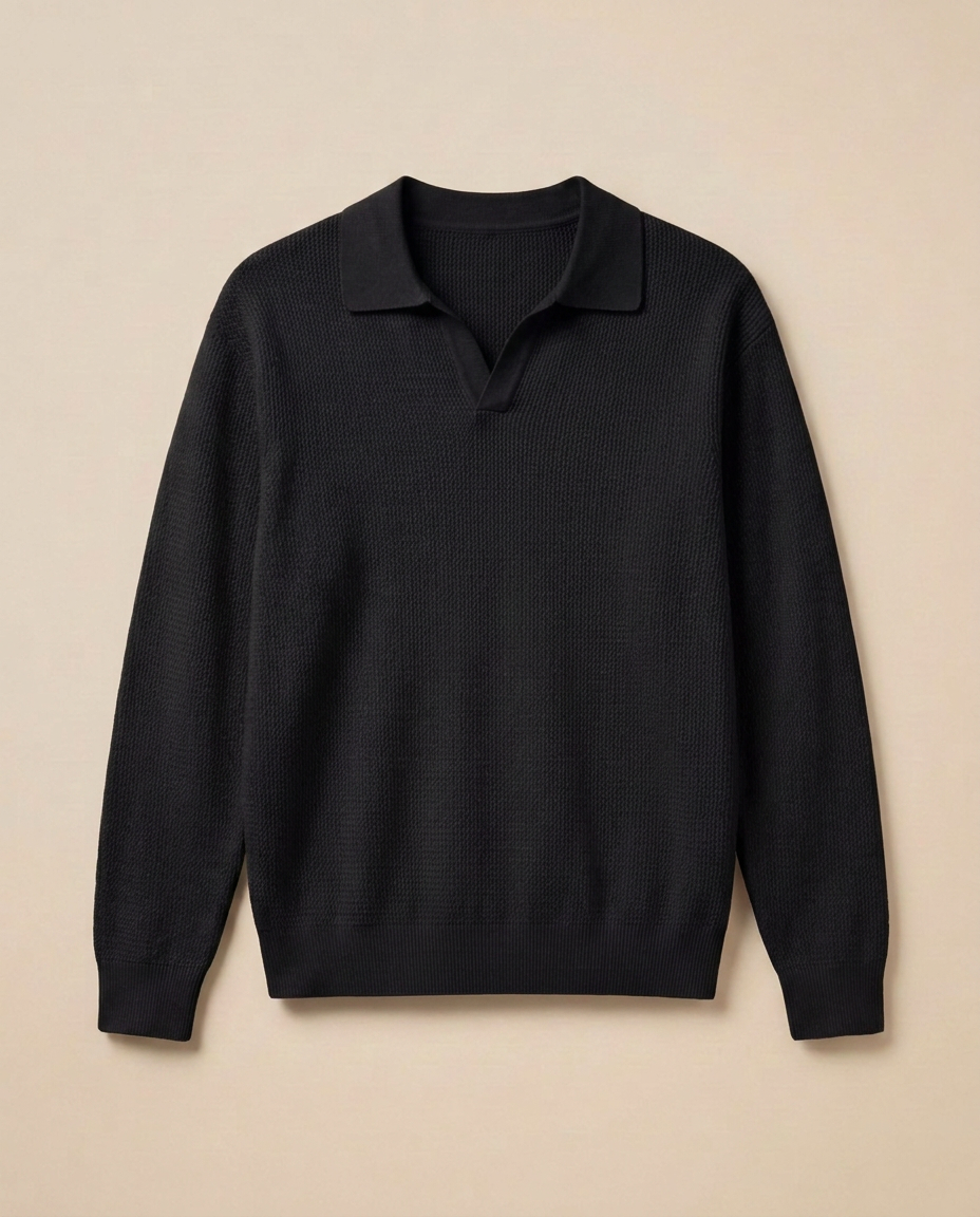 Antibes Knit Polo in Noir, front packshot on a warm beige background