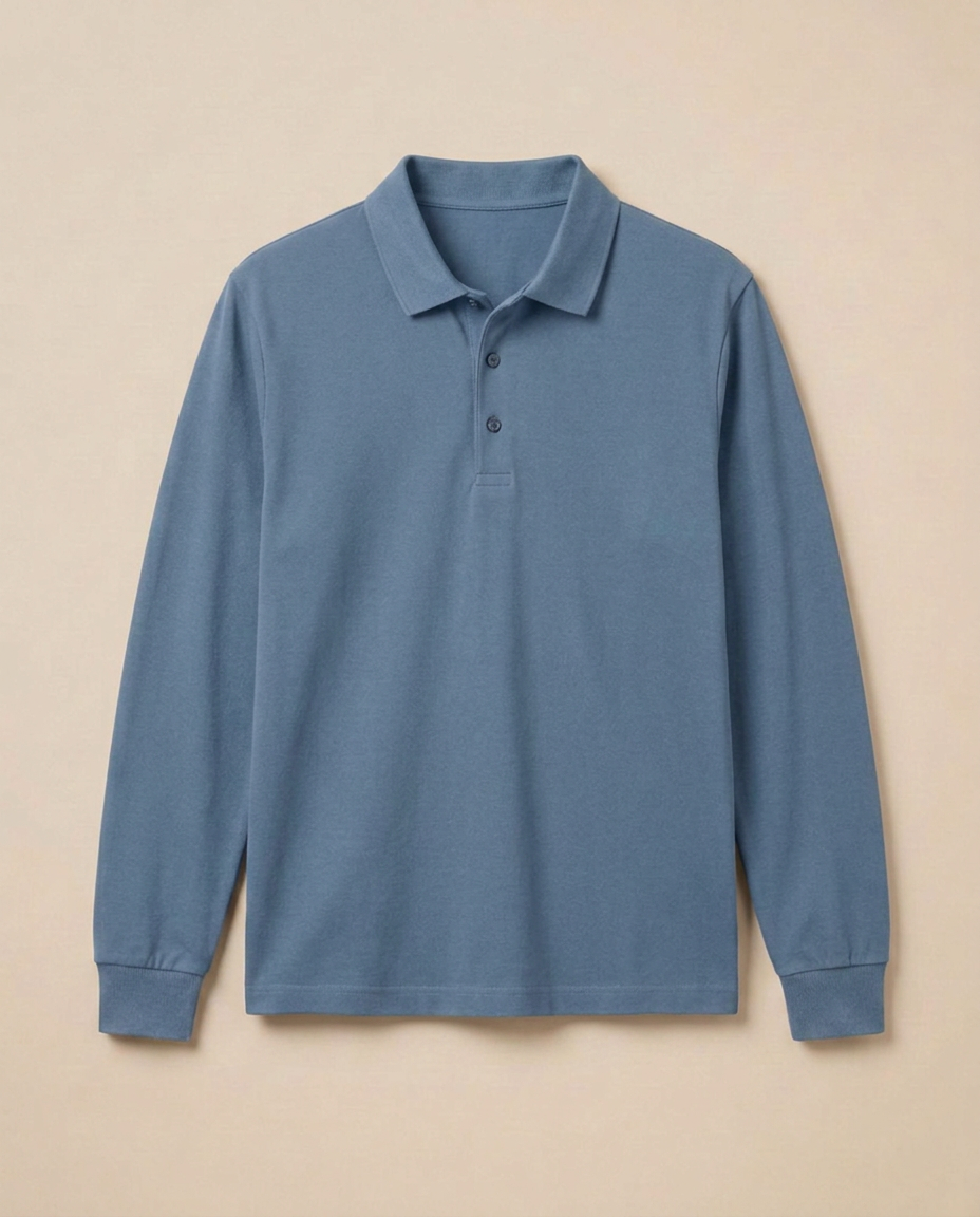 Menton Polo Shirt in Misty Blue, front packshot on a warm beige background